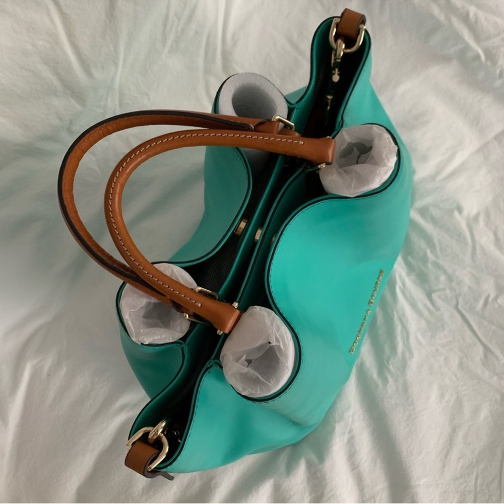 Dooney & Bourke southwest Turquoise Barlow purse
Like New !!!!!! SALE!!!!!!! - Picture 2 of 11
